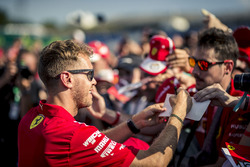 Sebastian Vettel, Ferrari signs autographs for the fans