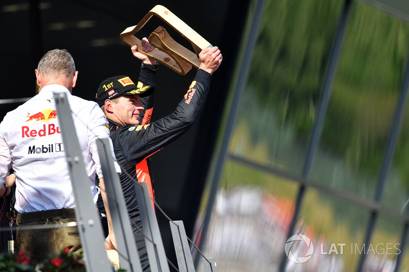 Race winner Max Verstappen, Red Bull Racing celebrates on the podium with the trophy