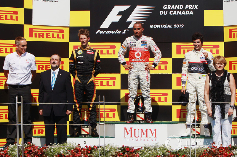 Podio: ganador de la carrera Lewis Hamilton, McLaren, segundo lugar Romain Grosjean Lotus F1, tercer