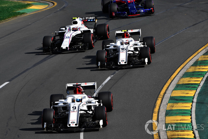 Marcus Ericsson, Sauber C37 leads Charles Leclerc, Sauber C37