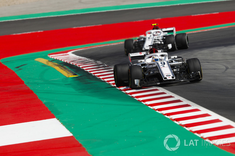 Marcus Ericsson, Sauber C37, leads Charles Leclerc, Sauber C37