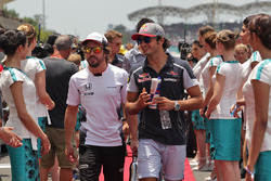 (L to R): Fernando Alonso, McLaren and Carlos Sainz Jr., Scuderia Toro Rosso on the drivers parade
