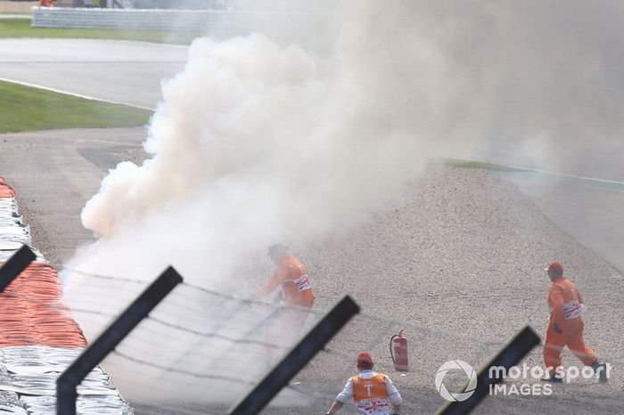 La moto di Andrea Dovizioso, Ducati Team, in fiamme