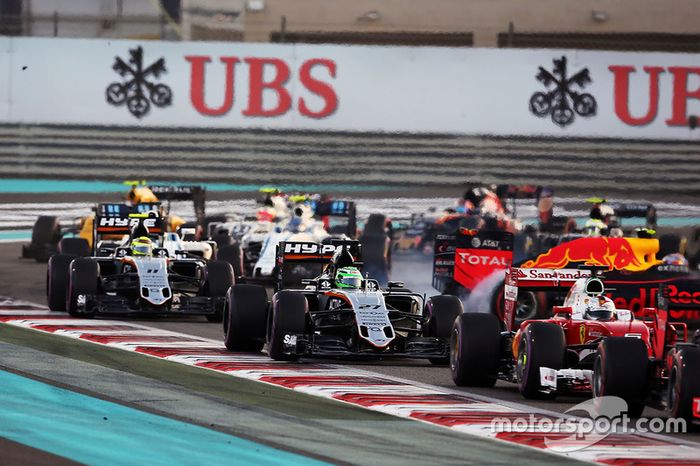 Nico Hulkenberg, Sahara Force India F1 VJM09 at the start of the race as Max Verstappen, Red Bull Racing RB12 spins