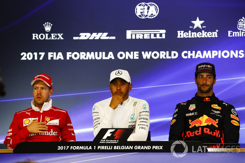 Race winner Lewis Hamilton, Mercedes AMG F1, second place Sebastian Vettel, Ferrari, third place Dan