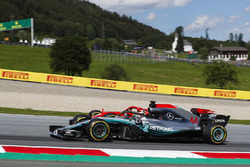 Sebastian Vettel, Ferrari SF71H, passes Lewis Hamilton, Mercedes AMG F1 W09