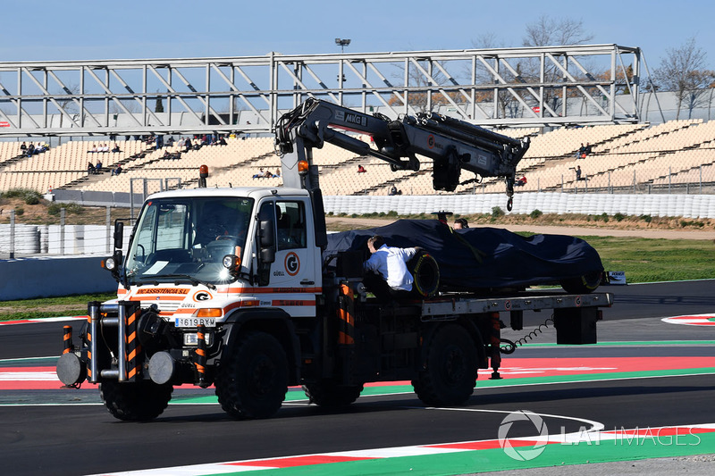 The car of Charles Leclerc, Alfa Romeo Sauber C37 is recovered to the pits