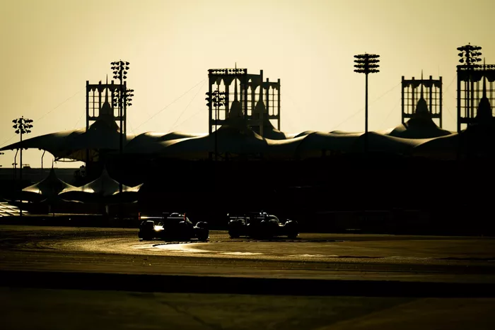 Track action at sunset