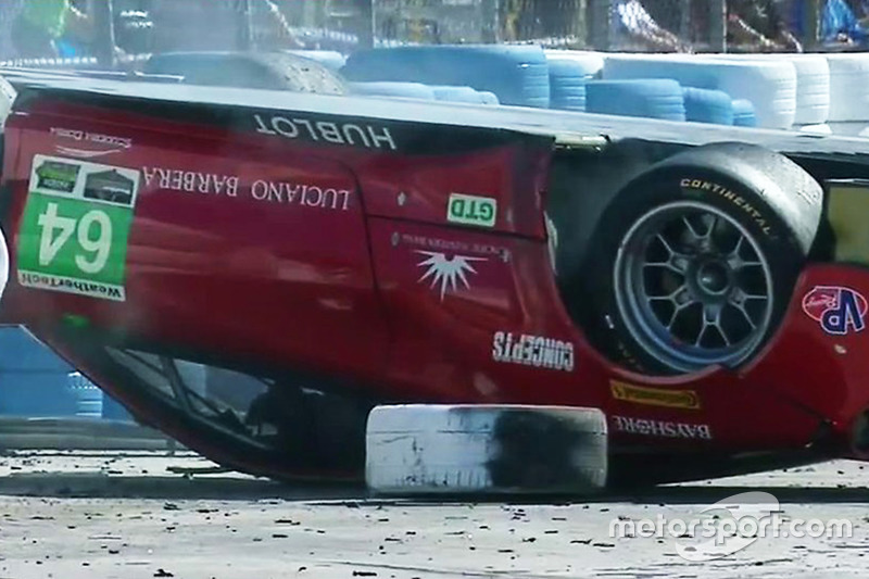 #64 Scuderia Corsa Ferrari 488 GT3, GTD: Bill Sweedler, Townsend Bell, Frankie Montecalvo upside down after crash