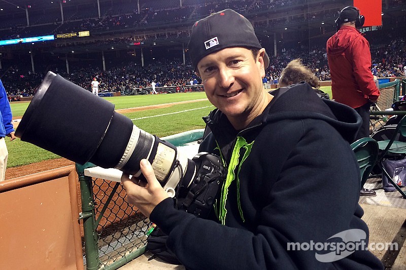 Kurt Busch covers a Cincinnati Reds vs. Chicago Cubs baseball game as a photographer