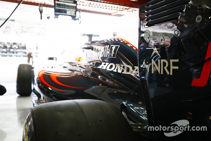 Fernando Alonso, McLaren MP4-31 prepares to leave the garage