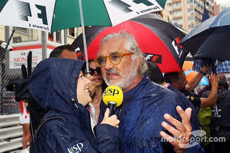 (L to R): Jennie Gow, BBC Radio 5 Live Pitlane Reporter with Flavio Briatore, on the grid