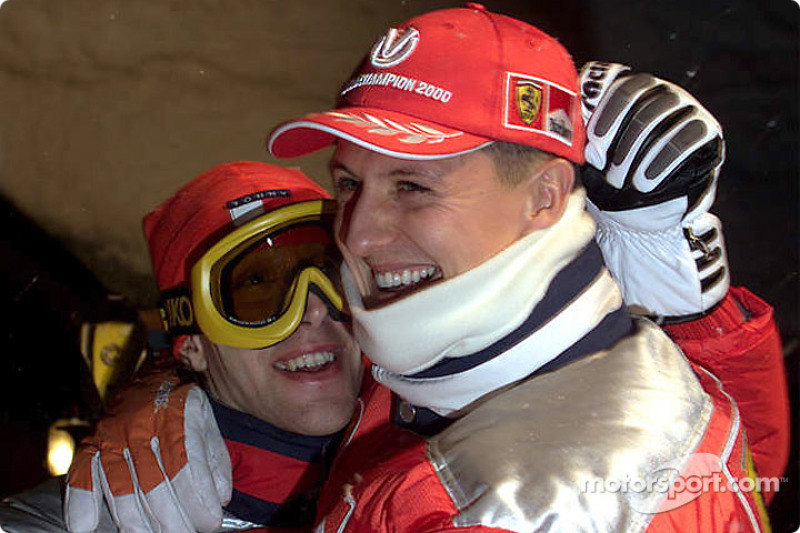 Michael hugs Ferrari'in test-driver Luca Badoer