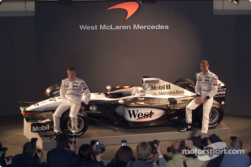 Kimi Raikkonen and David Coulthard with the new McLaren Mercedes MP4-17