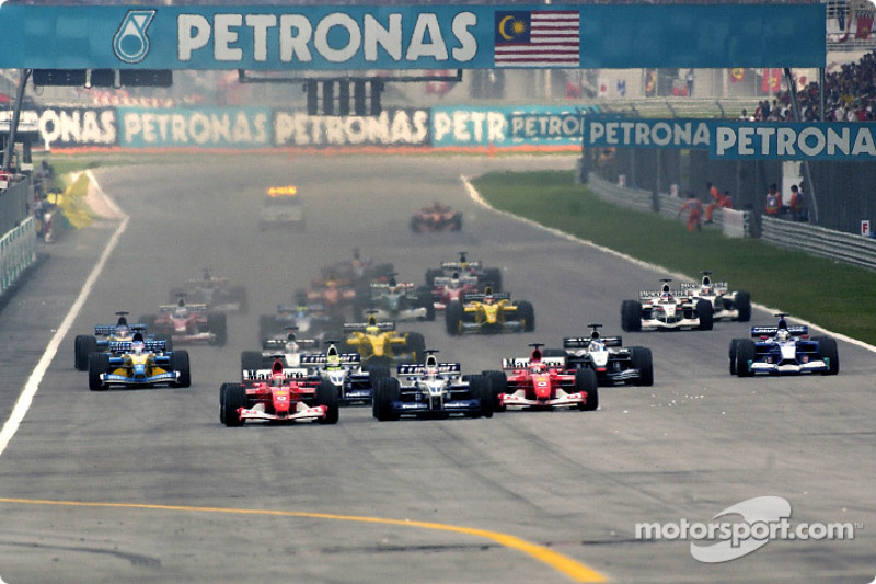 start: Michael Schumacher, Juan Pablo Montoya ve Rubens Barrichello leading field