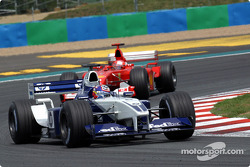 Juan Pablo Montoya and Michael Schumacher battling