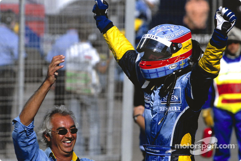 Race winner Fernando Alonso celebrates