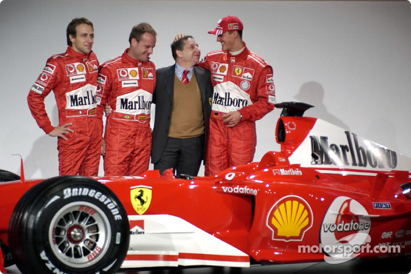 Luca Badoer, Rubens Barrichello, Jean Todt and Michael Schumacher with the new Ferrari F2004