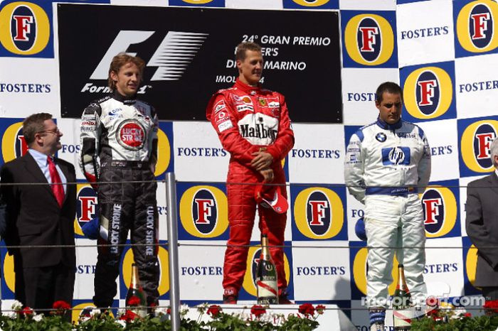 Podio: el ganador de la carrera Michael Schumacher con Jenson Button y Juan Pablo Montoya