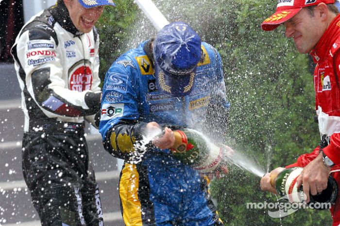 Podio: champagne para Jarno Trulli, Jenson Button y Rubens Barrichello