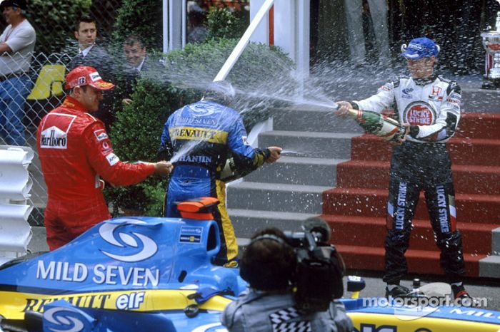 Podio: champagne para Jarno Trulli, Jenson Button y Rubens Barrichello