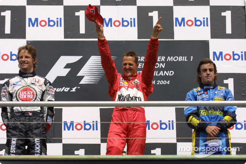 Podium: race winner Michael Schumacher with Jenson Button and Fernando Alonso