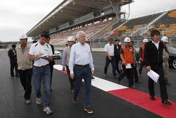 FIA Formula One Race Director and Safety Delegate Charlie Whiting carries out a site inspection  of 