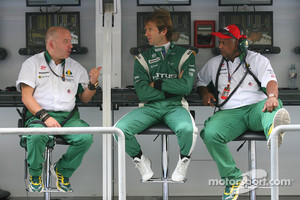 Mike Gascoyne, Lotus F1 Team, Chief Technical Officer with Jarno Trulli, Lotus F1 Team and Tony Fernandes, Lotus F1 Team, Team Principal