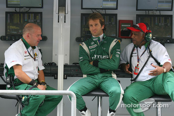 Mike Gascoyne, Lotus F1 Team, Chief Technical Officer with Jarno Trulli, Lotus F1 Team and Tony Fernandes, Lotus F1 Team, Team Principal