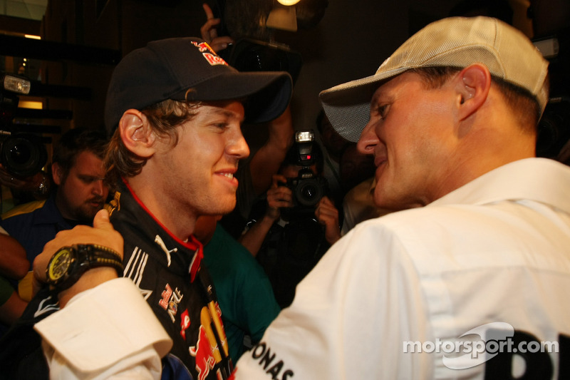 Michael Schumacher, Mercedes GP congratulates Sebastian Vettel, Red Bull Racing