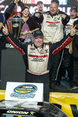 Championship victory lane: 2010 NASCAR Camping World Truck Series champion Todd Bodine celebrates