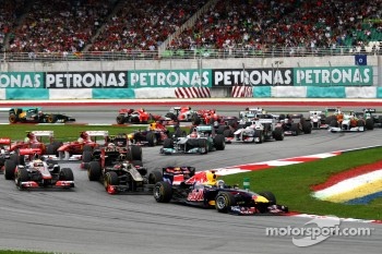 Sebastian Vettel, Red Bull Racing leads the start of the race
