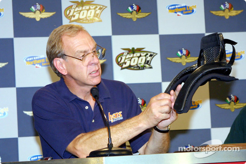 Robert Hubbard holding HANS device