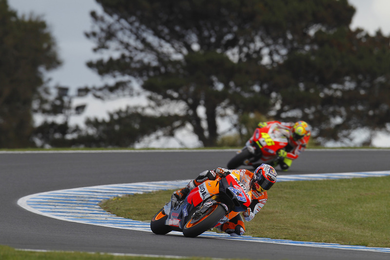 Casey Stoner, Repsol Honda Team; Valentino Rossi, Ducati Team