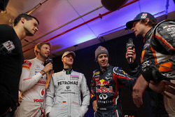 Jenson Button, Michael Schumacher, Sebastian Vettel e Travis Pastrana