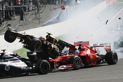A crash at the start involving Lewis Hamilton, McLaren, Romain Grosjean, Lotus F1, Fernando Alonso,