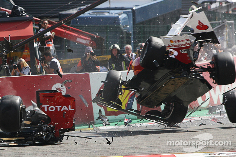 A crash at the start involving Lewis Hamilton, McLaren, Romain Grosjean, Lotus F1, Fernando Alonso, Ferrari, Kamui Kobayashi, Sauber