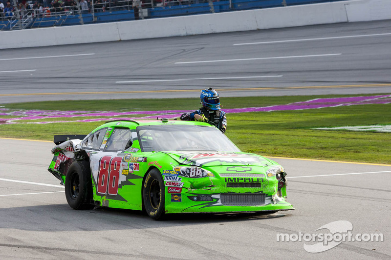 Dale Earnhardt Jr., Hendrick Motorsports Chevrolet gives a ride to Jimmie Johnson back to the pits