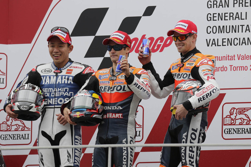 Подіум: переможець гонки Дані Педроса, Repsol Honda Team, друге місце Катсуюкі Накасуга, Yamaha Factory Racing, третє місце Кейсі Стоунер, Repsol Honda Team