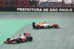 Nico Hulkenberg, Sahara Force India F1 and Lewis Hamilton, McLaren crash battling for the lead of the race