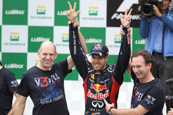 Sebastian Vettel, Red Bull Racing celebrates with the team and Adrian Newey, Red Bull Racing Chief Technical Officer and Christian Horner, Red Bull Racing Team Principal