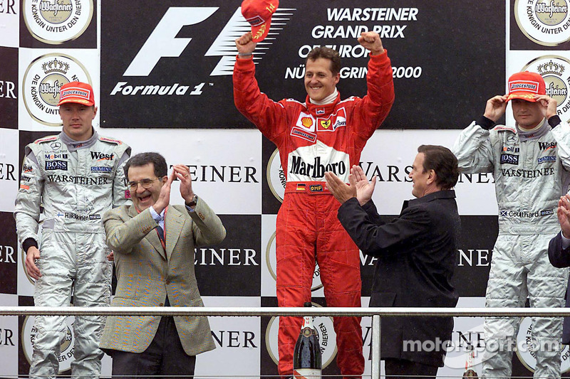 Podium: race winner Michael Schumacher, second place Mika Hakkinen, third place David Coulthard