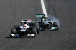 Pastor Maldonado, Williams F1 Team e Nico Rosberg, Mercedes GP