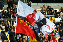 Bandiere per Michael Schumacher, e Sebastian Vettel, Red Bull Racing.