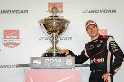 Championship winner Will Power celebrates