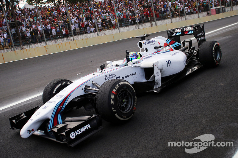 Third placed Felipe Massa, Williams FW36 celebrates at the end of the race