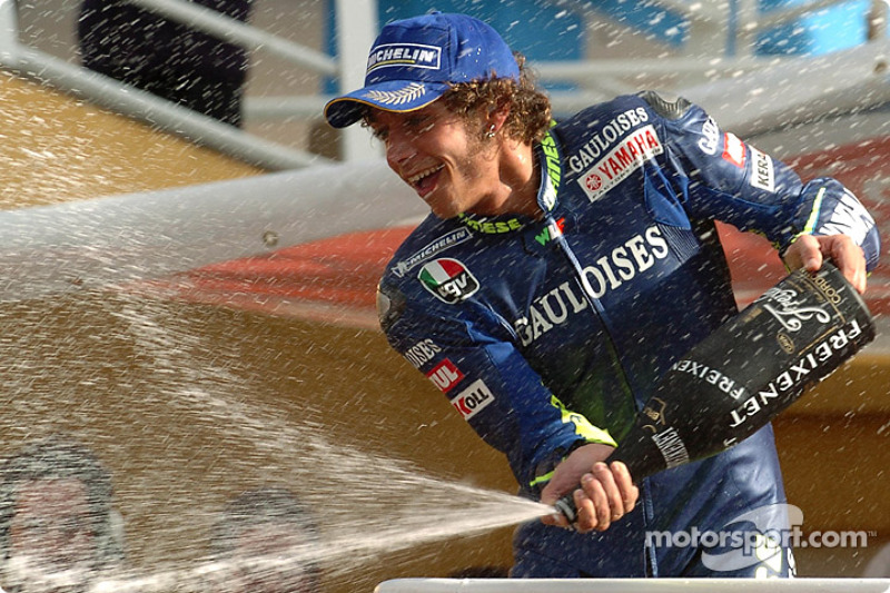 Podium: champagne for Valentino Rossi