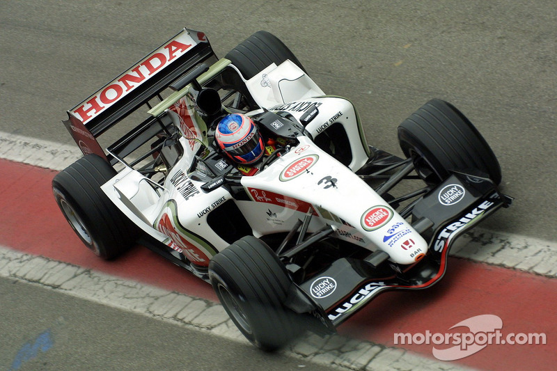 Jenson Button returns to pitlane