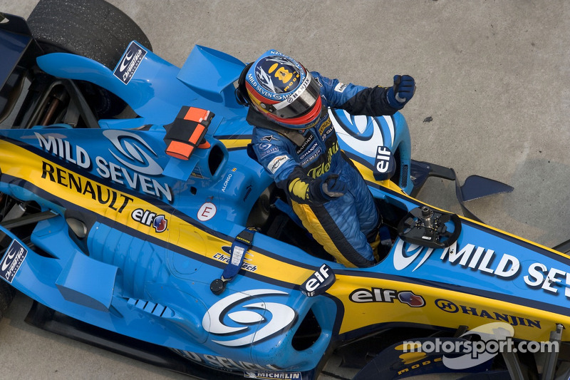 Race winner Fernando Alonso celebrates