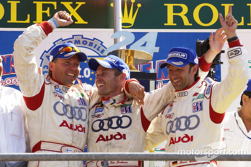 P1 podium: class and overall winners JJ Lehto, Tom Kristensen and Marco Werner celebrate